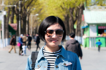 happy chinese woman at Harbin Stalin Park