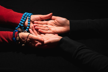 an old woman witch looks into a girl's hands and guesses fate