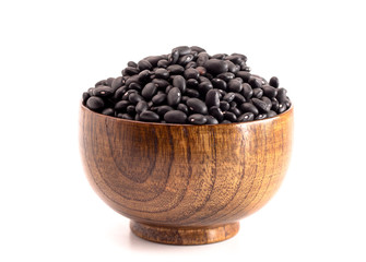 Bowl of Dry Black Beans Isolated on a White Background