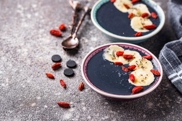 Black charcoal smoothie with goji