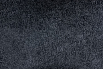 Closeup textured grey black leather background, big grain