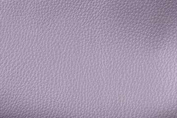 Fototapeta na wymiar Closeup textured lilac leather background, big grain
