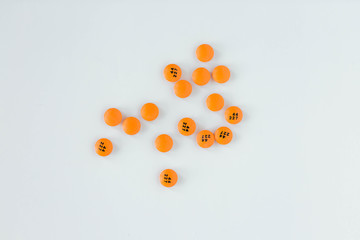 Group of assorted orange prescription pills