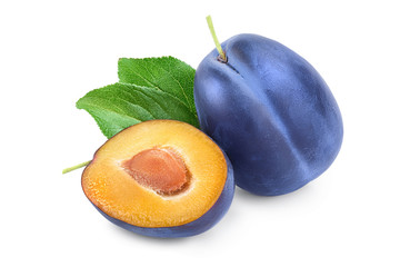fresh blue plum and half with leaves isolated on white background