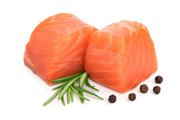 raw salmon piece cube with rosemary and peppercorn isolated on white background close up