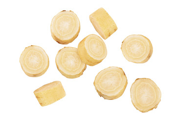 Parsnip root slices with parsley isolated on white background with clipping path. Top view. Flat lay