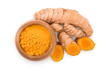 Turmeric powder and turmeric root isolated on white background. Top view. Flat lay