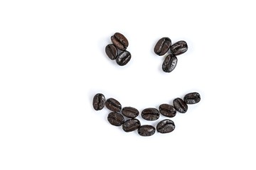 dark roasted coffee in the shape of a smile isolated on the white