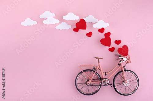 Happy Valentine's day. bicycle and flying hearts. Mother's Day or Women's Day, greeting cards, invitations and posters.