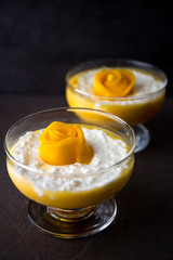 Sweet tapioca pudding with coconut milk and fresh mango flowers