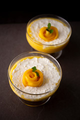 Sweet tapioca pudding with coconut milk and fresh mango flowers