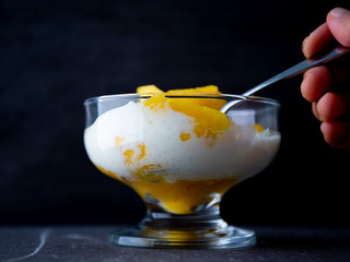 Sweet tapioca pudding with coconut milk and fresh mango