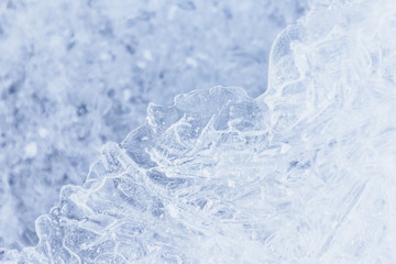 Ice texture, interesting frozen lake patterns, naturally created forms. Frozen river's water in the winter in mount Vitosha, near Sofia, Bulgaria. Ice Age climate changes.