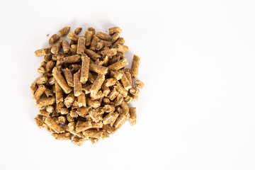 Pile of compressed wood pellets
