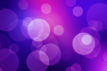 Purple bokeh lights abstract background.
