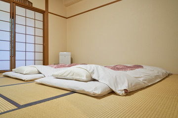 Fototapeta na wymiar japanese room and traditional soft bed in fukushima