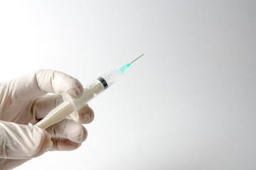 Medical concept with syringe for vaccination isolated on white.