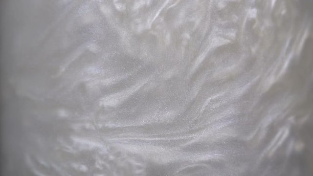 Rheoscopic fluid. Beautiful movement of particles in a liquid. Fantastic patterns and shapes. 50 fps