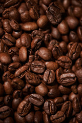Brown roasted coffee beans. Close-up.
