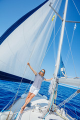 Fototapeta premium Beautiful woman relaxing On Yacht in Greece