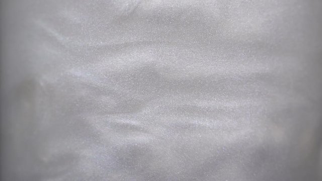 Rheoscopic fluid. Beautiful movement of particles in a liquid. Fantastic patterns and shapes. 50 fps