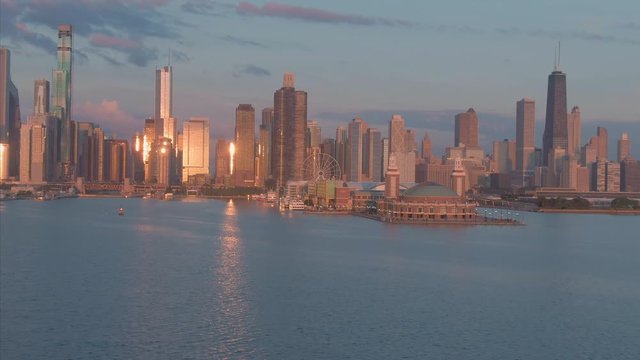 Aerial: Lake Michigan & Chicago city skyline at sunrise. illinois, USA