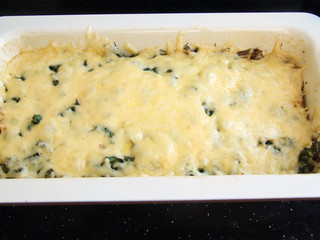 casserole with vegetables, grated cheese on top. Form for baking, dish with vegetables, vegetarian.