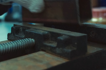 Vise on workbench. Equipment locksmith workshop. equipment for a