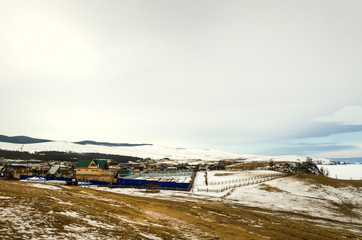 Village on the edge of Baikal lake in winter