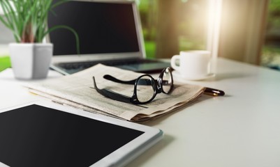 Newspapers on the laptop. Online news.