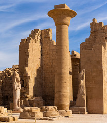 Egypt, Luxor - Karnak Temple, complex of Amun-Re. Statues of Ramses II and Nefertiti.