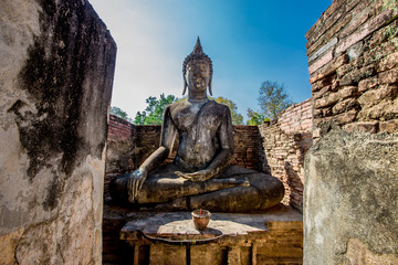 Background Unseen tourist attractions in Thailand (Big Buddha statue in Wat Si Chum) in Sukhothai province, tourists always come to see the beauty.