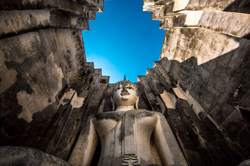 Background Unseen tourist attractions in Thailand (Big Buddha statue in Wat Si Chum) in Sukhothai province, tourists always come to see the beauty.