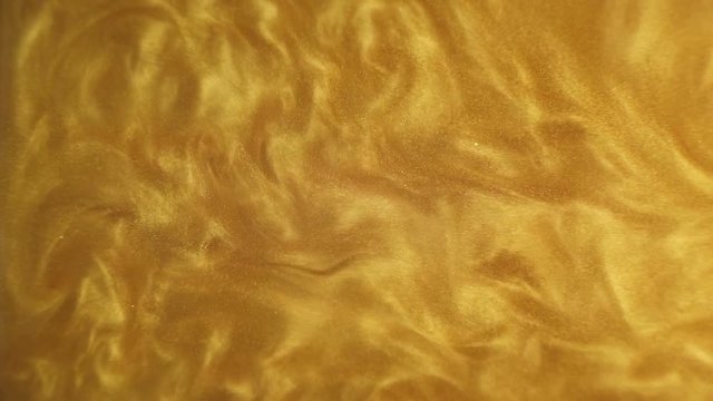 Rheoscopic fluid. Beautiful movement of particles in a liquid. Fantastic patterns and shapes. 50 fps
