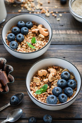 Homemade Chocolate Nut Granola with Fresh Blueberries.
