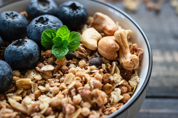 Homemade Chocolate Nut Granola with Fresh Blueberries.
