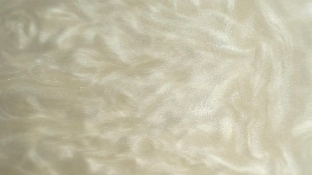 Rheoscopic fluid. Beautiful movement of particles in a liquid. Fantastic patterns and shapes. 50 fps