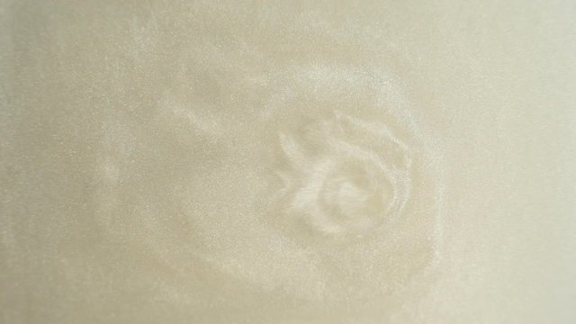 Rheoscopic fluid. Beautiful movement of particles in a liquid. Fantastic patterns and shapes. 50 fps