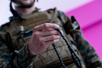 soldier praying tespih