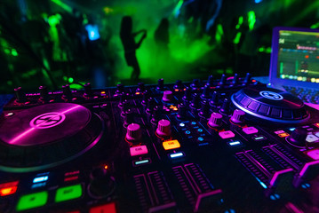 Fototapeta na wymiar music mixer DJ controller Board for professional mixing of electronic music