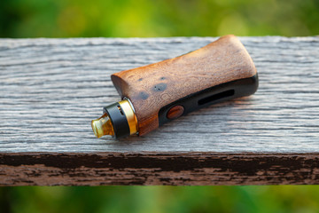 high end rebuildable dripping atomizer with stabilized natural walnut wood regulated box mods,...