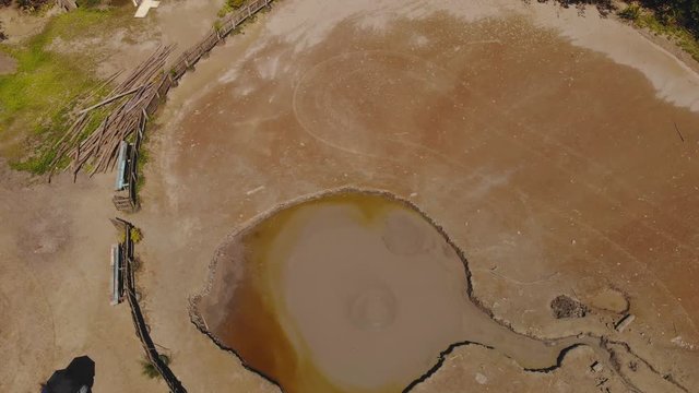 With its outpourings covering a large area L'eau Michel mud Volcano has mud rising in the form of bubbles and flowing down the sides