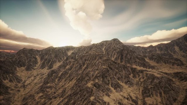 mountain landscape in high altitude with rays of light