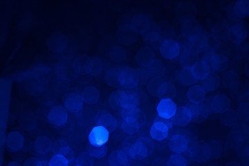blue glitter vintage lights background,bokeh background,defocused