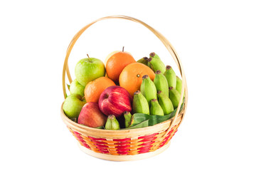 fresh orange, Chinese pear, banana, green apple and red apple in bamboo wicker basket on white background fruit health food isolated