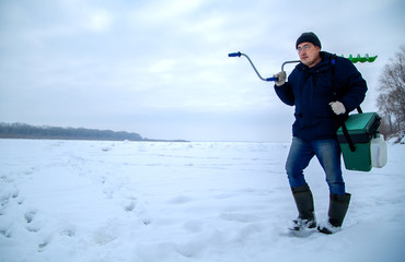 man on a winter fishing