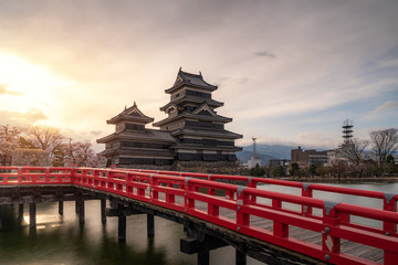 Matsumoto Castle during cherry blossom (Sakura) is one of the most famous sights in Matsumoto, Nagano, Japan. Asian tourism, history building, or tradition culture and travel concept