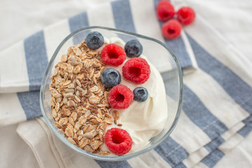 Granola with yogurt and berries for healthy breakfast