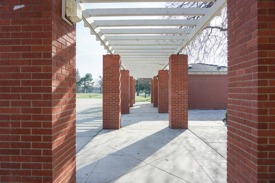 The brick design and wooden roof
