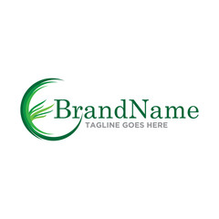 Fototapeta premium Grass and leaf logo icon vector. Nature logo grass icon template.